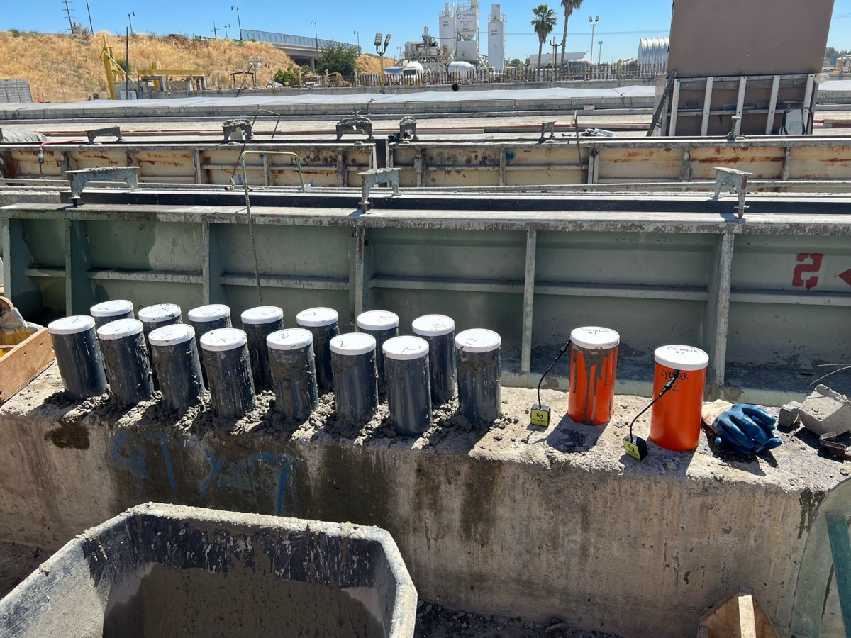 Con-Fab precast cylinder samples with SensyRoc sensors on the production bed