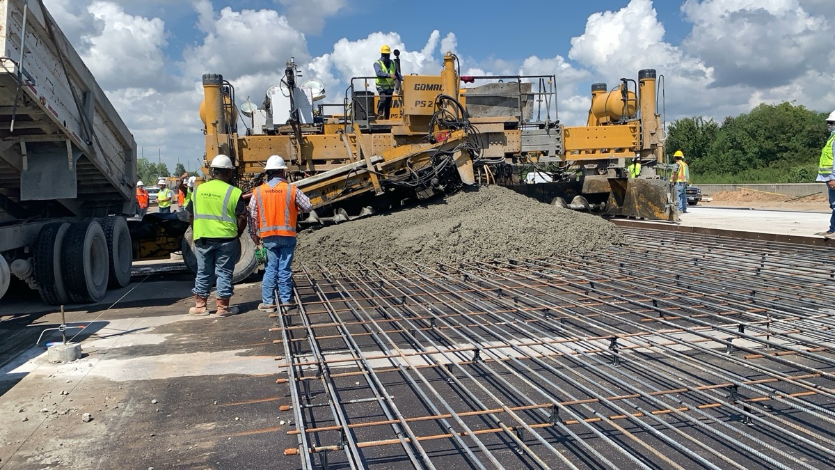 Webber Texas DOT highway crew pouring monitored concrete
